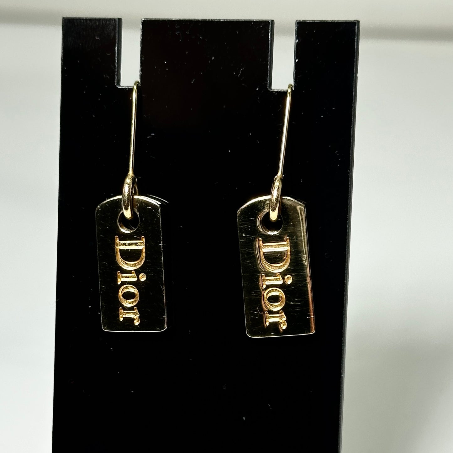 DIOR GOLD TONE TAG EARRINGS