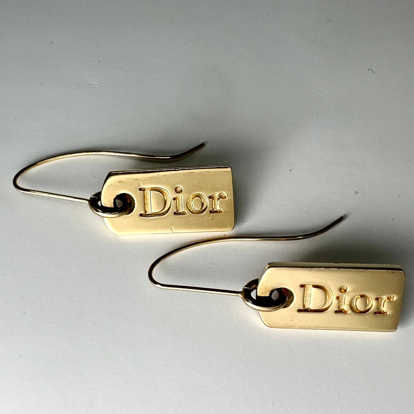 DIOR GOLD TONE TAG EARRINGS